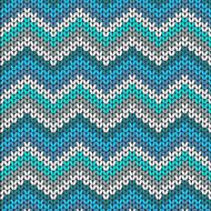 Knitted geometric pattern in blue white and grey