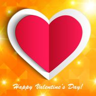 Paper heart isolated on shiny orange background