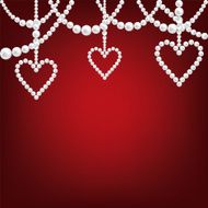 pearl hacklace and heart