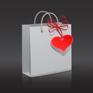 Paper bag with red heart tag
