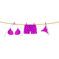 Bikini and boxer shorts hanging on rope N5