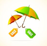 Sale labels with umbrellas spring
