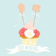 Festive wedding cakes with decorative wooden heads of groom (fia