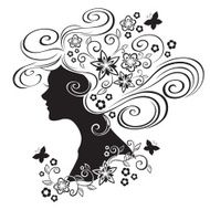 Silhouette of a beautiful girl with flowers in hair