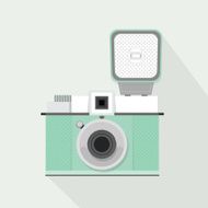 Retro light seafoam color camera with flash long shadow