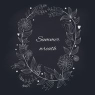 Summer wreath on a blackboard