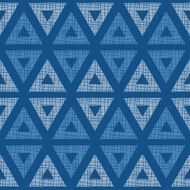 Abstract textile blue triangles ikat seamless pattern background