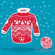 Red knitted christmas sweater and a ball of yarn