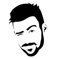 Portrait of young bearded charming man winking at camera
