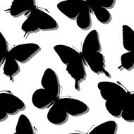 Beautiful seamless background with butterflies silhouettes