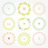 Nine vector spring round frames with fresh leaves and flowers