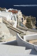 white houses on the coastline in Santorini, Greece