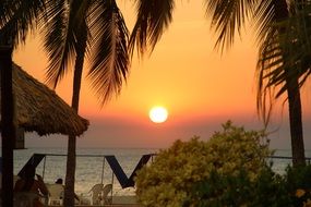 tropical beach at sunset, idyll landscape