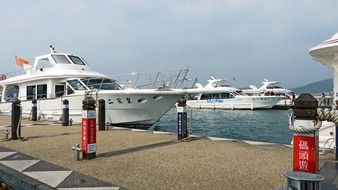 white yacht at the pier on the moon lake in China