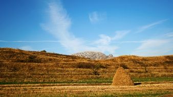 haystack in the autumn landscape