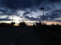 dark sunset over city street