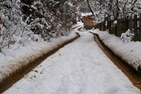 cottage and snow road winter scene