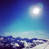 bright blinding sun over the mountains