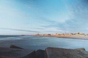 landscape of a town by the ocean beach
