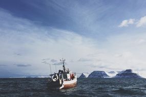 white ship in the arctic ocean