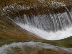 a strong flow of water