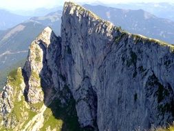 sheep mountain with sheer stone walls