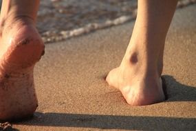 barefoot on a sand