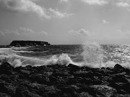 black and white photo of sea waves beating on the coast of Cyprus