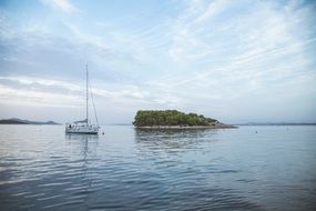 landscape of a boat and island