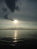 romantic reflection of the evening sun in the lake