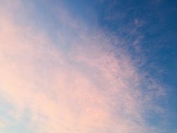 blue sky with light-pink clouds