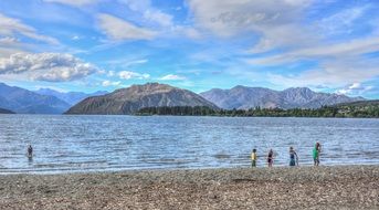 people near new zealand lake