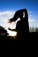 Woman silhouette sky sun trees landscape