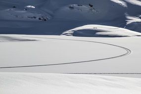 tracks on snow, winter mountain landscape