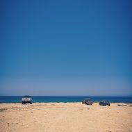 beach cars sky