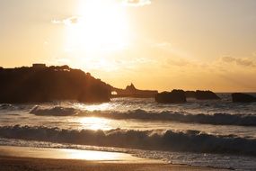 rocky coast in France at sunset