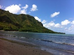 picturesque beach against the mountain