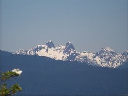 Lions, pair of pointed peaks at sky, canada, vancouver