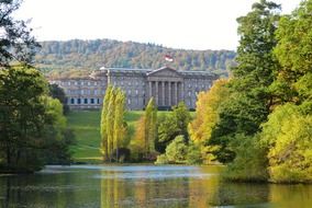 castle at pond in landscape park Bergpark WilhelmshÃ¶he at autumn, germany, kassel