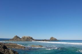 waves near the stones in the sea