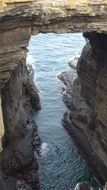 natural stone bridge over the ocean