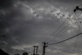 power lines against the backdrop of a stormy sky