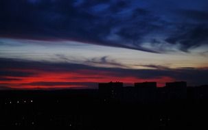 bright scarlet sunset over the city