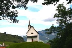 Church on the background of the picturesque landscape of Switzerland