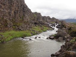 stream at rocky mountains, iceland