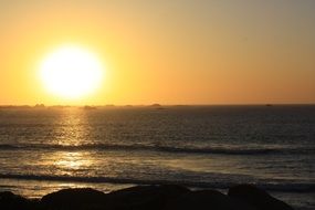 sun in the sunset over the ocean
