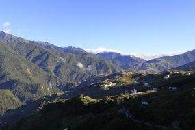 panorama of settlements in the mountains on a sunny day