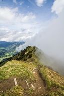 white cloud on top of kanzelwand mountain, austria