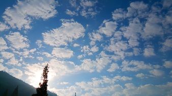 A lot of the white clouds in the beautiful blue sky