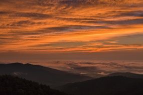 colorful evening sky over the hills